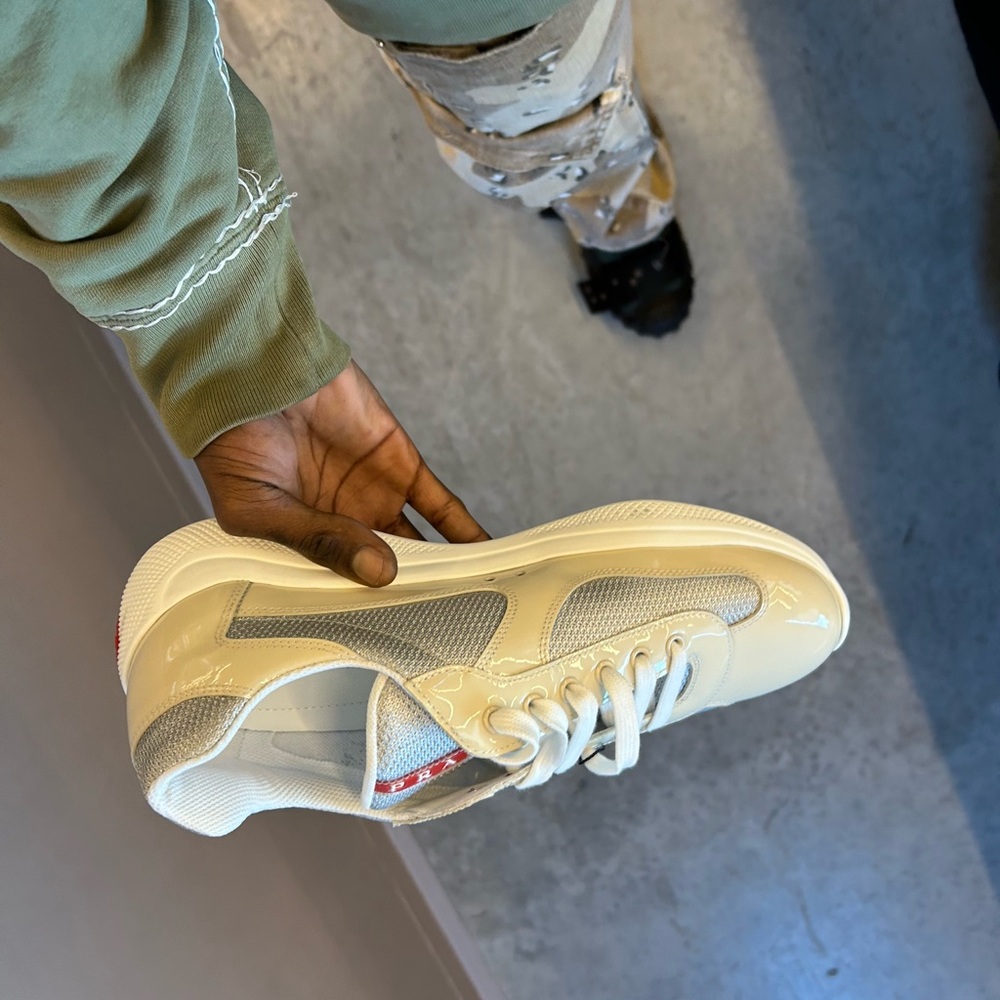 Brand new Prada size 9.5 UK but 10.5 is fits a 10 10.5 feet